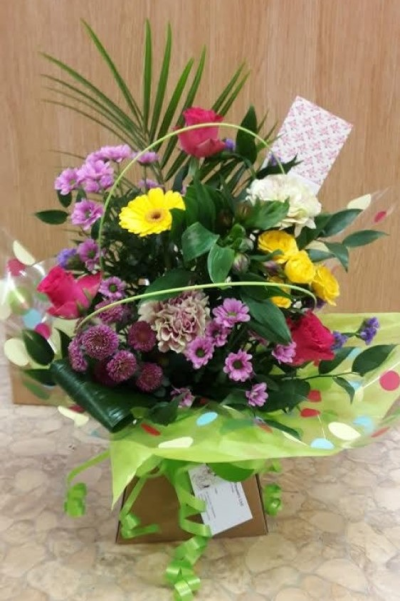 Castle Box Mixed - A beautiful mixed bouquet arranged in a castle box. Perfect for a cheerful occasion.