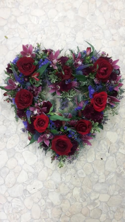 Red and Purple open heart - A beautiful red rose  and Purple filler heart tribute. Call us for more information on T: 01948 661111 for more information on this product for sizes,  flowers and prices. 

15 " Start from £90.00

18" Start from £120.00

21" Start from £150.00 

Please choose the amount for the size you wish the product to be.