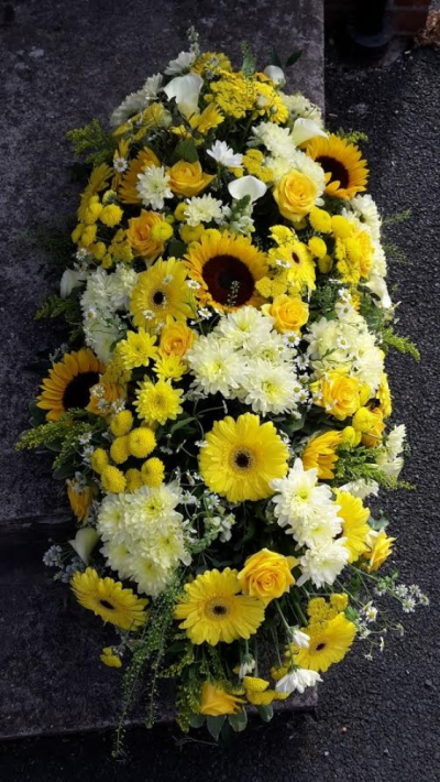 Traditional Yellow Coffin Spray - This coffin spray is filled with traditional flowers filler and greenary. Please call us on T:01948 661111 for more information on this funeral product. 

3FT Sprays start from £150.00

4FT Sprays start from £250.00

5FT Sprays start from £450.00.

Please choose the amount for the size you wish the product to be.